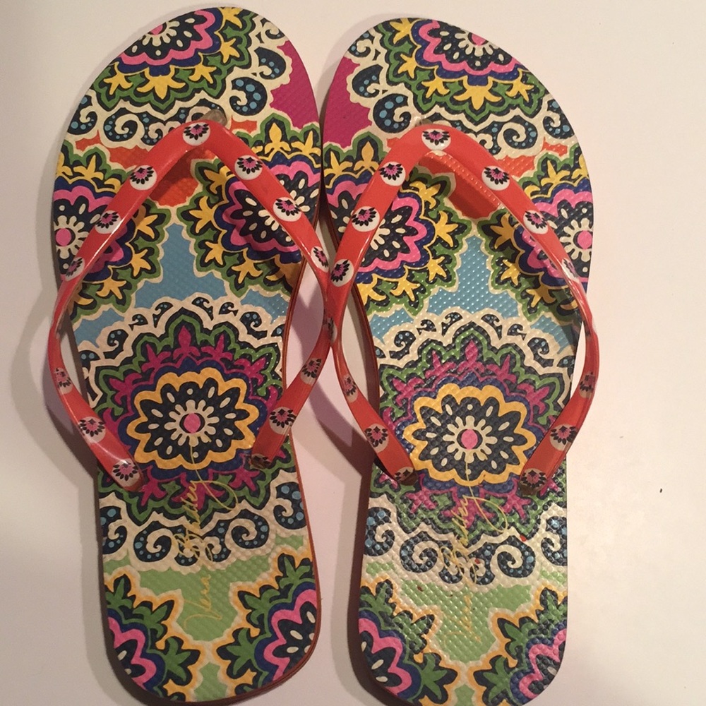 Vera Bradley floral print flip flops.